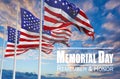 three Flags of United States of America being waved in the breeze against a sunset sky and the text Memorial Day, Remember and Royalty Free Stock Photo