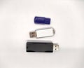 three flash drives. three USB flash drives on a white background top view Royalty Free Stock Photo