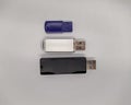 three flash drives. three USB flash drives on a white background top view Royalty Free Stock Photo