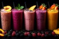 Three Flavors of Fruit Smoothies on a White Background Royalty Free Stock Photo