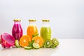 Three flavours of fruit juice in bottles Royalty Free Stock Photo