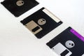 Three floppy disks on a white background Royalty Free Stock Photo