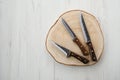 Forged Butchers Knives On Wooden Stump
