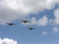 Three four-engine turboprop airplanes