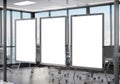 Three frames Mockup hanging on office glass window. Mock up of a billboards in modern company interior