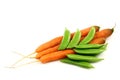 Three fresh carrots and some sugar snaps