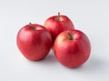 Three fresh, juicy, ripe, red apples isolated on a white background. Royalty Free Stock Photo