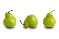 Three fresh Packham pears fruit in different position isolated on white background Royalty Free Stock Photo
