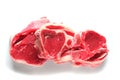 Three fresh raw lamb loin chops on a white background, isolated. Royalty Free Stock Photo