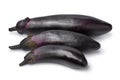 Three ripe purple eggplant close up isolated on white background Royalty Free Stock Photo