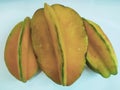 Three fresh starfruits in a close-up Royalty Free Stock Photo