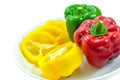 Three fresh sweet pepper on ceramic bowl Royalty Free Stock Photo