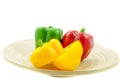 Three fresh sweet pepper on wood bowl Royalty Free Stock Photo