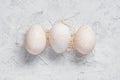 Three fresh turkey eggs on the white table Royalty Free Stock Photo