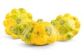 Three fresh yellow pattypan squashes on white background Royalty Free Stock Photo