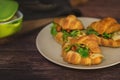 Three freshly baked stuffed butter croissants. Royalty Free Stock Photo