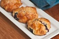 Three freshly baked, homemade blueberry scones