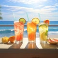Three freshly squeezed juices on a table on the beach 3