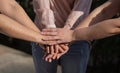 three friends joining hands and sharing on a summer afternoon Royalty Free Stock Photo