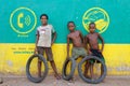 Three friends in a Madagascar village