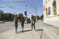 Three friends are walking around the city