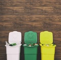 Three full dustbins for sorting trash