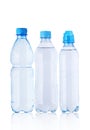 Three full plastic bottles with mineral water Royalty Free Stock Photo