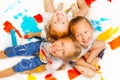 Three funny girls sitting on a floor