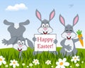 Three Funny Rabbits Wishing Happy Easter Royalty Free Stock Photo