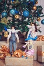 Three funny tilda angels sitting on new year gifts Royalty Free Stock Photo