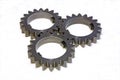 Three gear wheels on a white background Royalty Free Stock Photo