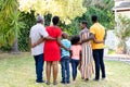 Three generation African American family spending time together in their garden. Royalty Free Stock Photo