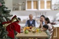 Three generation asian family eating meal on christmas day Royalty Free Stock Photo