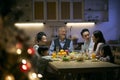 Three generation asian family having christmas dinner together at home Royalty Free Stock Photo