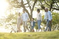 Three generation asian family walking in park Royalty Free Stock Photo