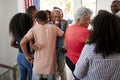 Three generation African American  family welcoming guests to their Independence Day party,back view Royalty Free Stock Photo