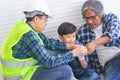 Generation of builders is helping to build brick wall for togetherness concept