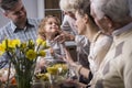 Three-generation family enjoying dinner