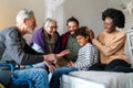 Three generation happy multiethnic family group at home Royalty Free Stock Photo