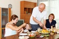 Three generations family over table at home Royalty Free Stock Photo