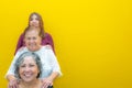 Three generations of latin Mexican women smiling in line, daughter, grandmother and granddaughter Royalty Free Stock Photo