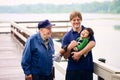 Three generations of males interacting together Royalty Free Stock Photo