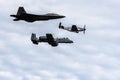 Three generations of US fighter planes fly at the annual Air and Sea Show. F-22 Raptor, F-15 Eagle and P-51 Mustang flying