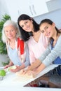 Three generations women baking together