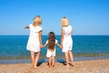 Three generations of women on the beach Royalty Free Stock Photo