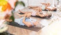 Three generations of women do preparatory stretching, lying on back and benting one leg at knee Royalty Free Stock Photo