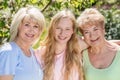 Three generations of women. Family spending time together in the garden