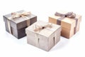 Three gift boxes with bows on a white background. Generative ai Royalty Free Stock Photo