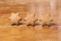 Three ginger cookies. Shape star. Blurred Background