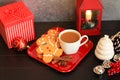 Three Gingerbread men top view with coffee on red dish Royalty Free Stock Photo